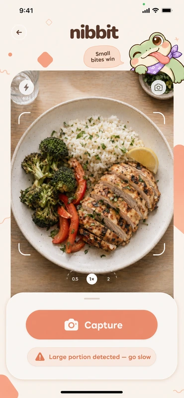Nibbit camera over a plate of chicken, rice, and broccoli. The screen says a large portion was detected, so go slow.